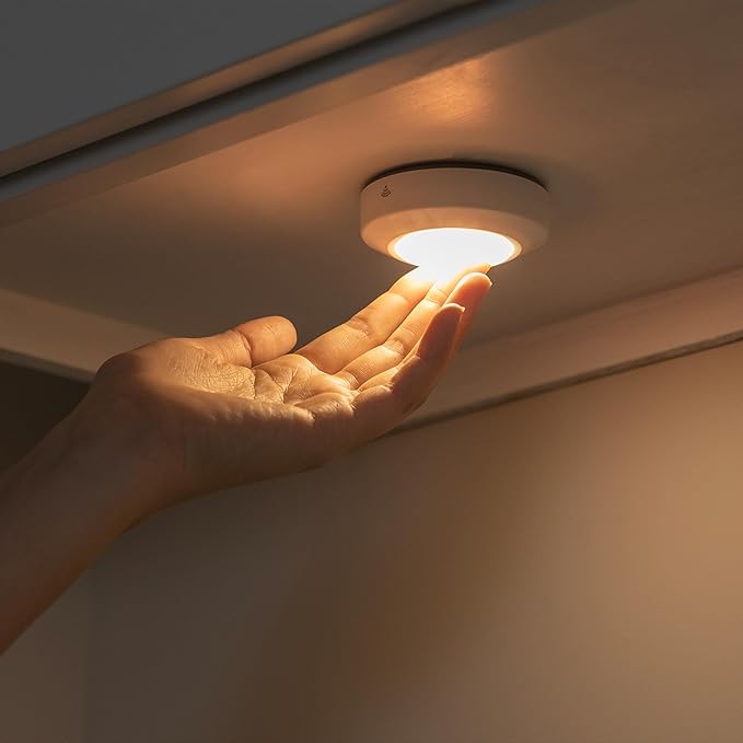 Amazon Basics LED Puck Lights, Color Changing, Battery Operated, IR Remote, 40 Lumens, 2 Pack, Wireless Stick on Lights, Under Cabinet Lighting, Ideal for Closets, and More, White