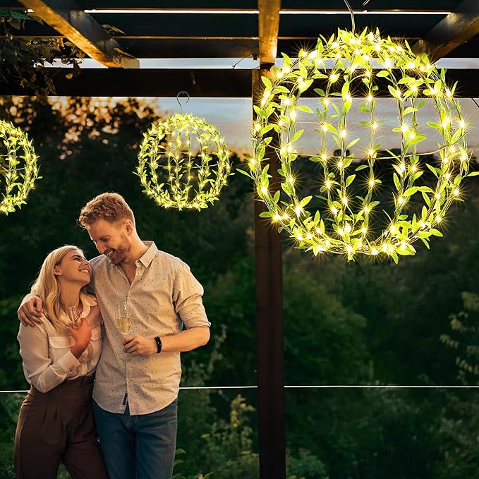 Solar Powered Hanging Iron Sphere Lights with Artificial Greenery – 12Inch 120 LED Waterproof Outdoor Decor Ball Light with Timer & 8 Modes – 2 Pack for Garden, Christmas, Weddings (Warm White)
